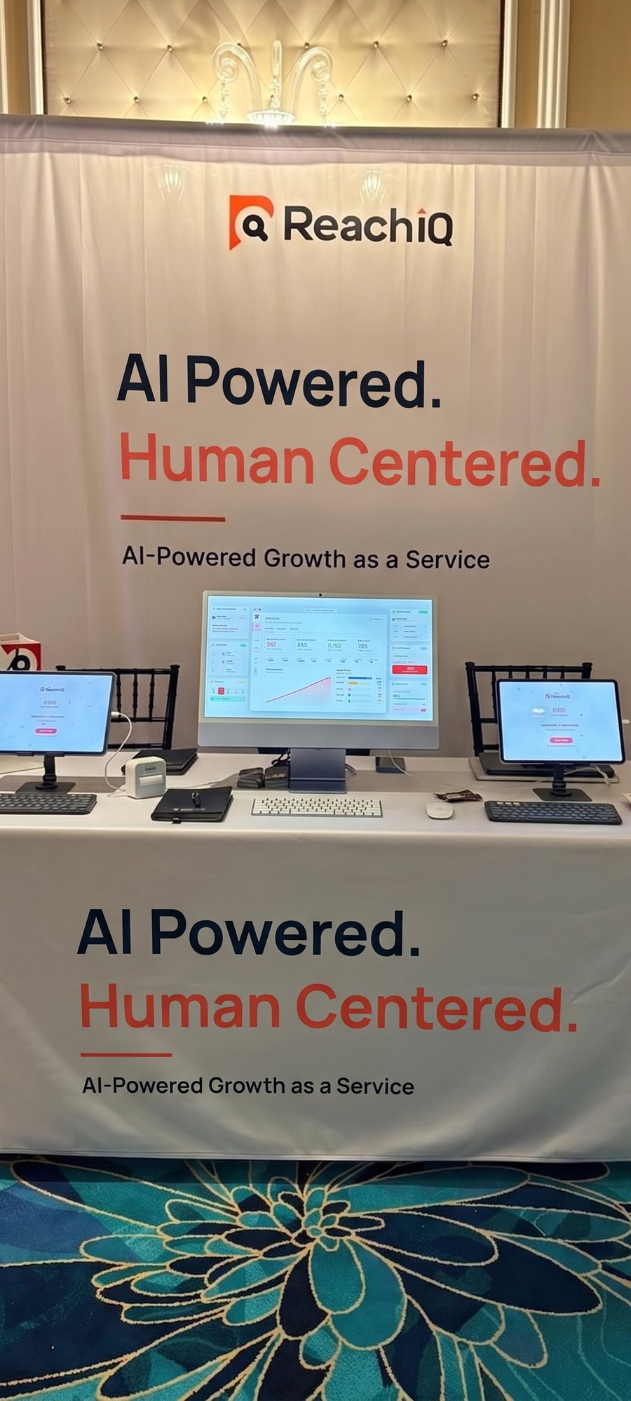 ReachIQ event booth — Precision. On Demand.
